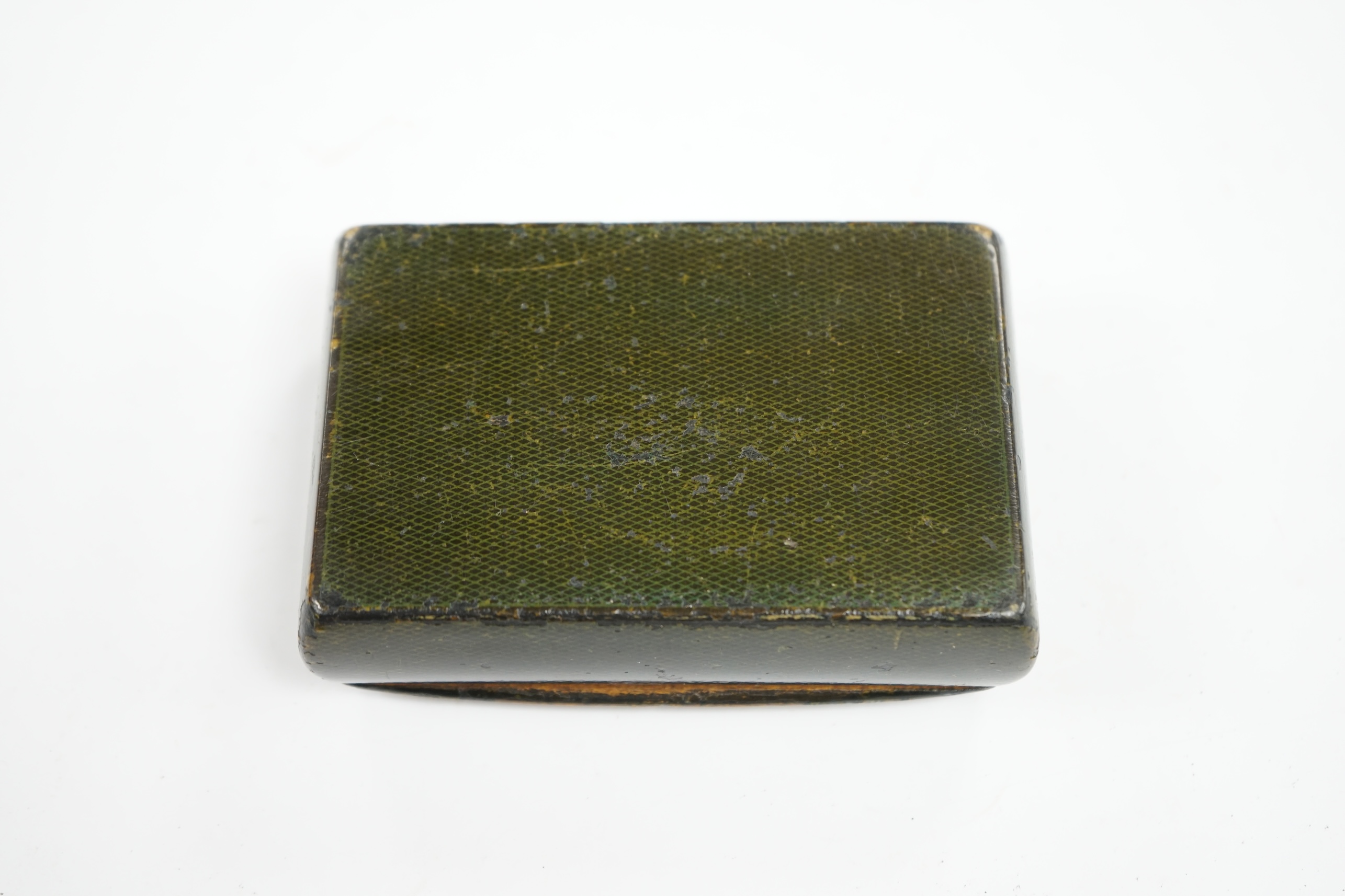 An early 19th century Scottish Mauchline ware penwork snuffbox, with green faux fish skin borders, 9.5cm wide. Condition - good